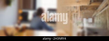 Image montage of architect working in office and empty wooden construction site with blurred effect Stock Photo