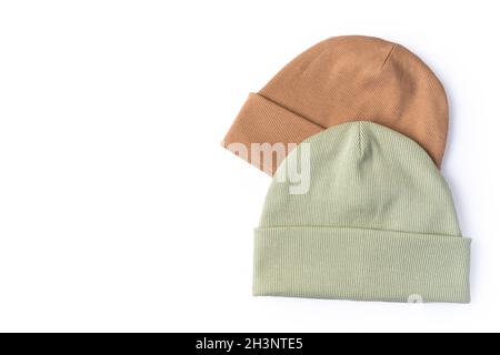 Two beanie hats in pastel colors for comfortable autumn and winter weather with a place for text on a white background Stock Photo