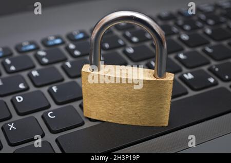 Cyber safety concept - lock on computer keyboard Stock Photo
