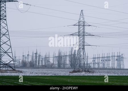 Power lines in a large number. High-voltage power lines. Stock Photo