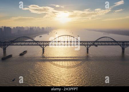 Jiujiang yangtze river bridge at dusk Stock Photo