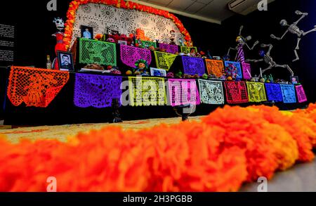 San Salvador, El Salvador. 29th Oct, 2021. An altar displaying traditional elements from Mexican culture and images of deceased Salvadorans, ahead of the celebration. The Mexican embassy in El Salvador has prepared an altar displaying pictures of deceased people ahead of the day of the dead celebrations. Credit: SOPA Images Limited/17�Թ����� Live News Stock Photo