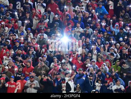 Atlanta, USA. 29th Oct, 2021. Atlanta Braves fans wearing pearl necklaces  in the style of Braves right fielder Joc Pederson before the start of game  three of the MLB World Series against