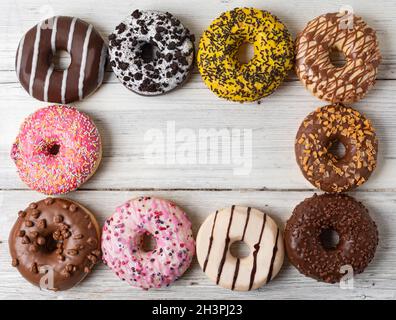Donuts on a wooden background Stock Photo