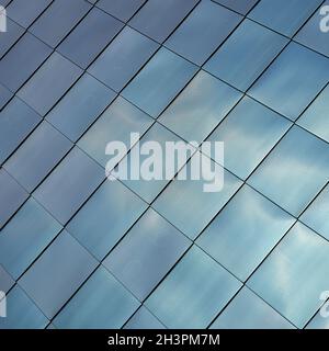 Stainless steel facade cladding on a modern building in downtown Magdeburg in Germany Stock Photo