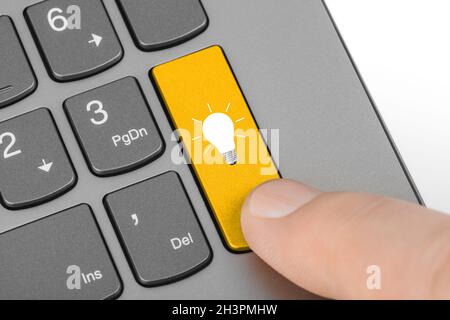 Computer keyboard with lamp key Stock Photo