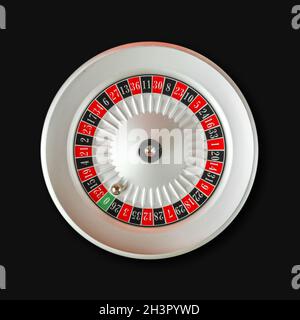 Casino roulette wheel isolated on Black background Stock Photo