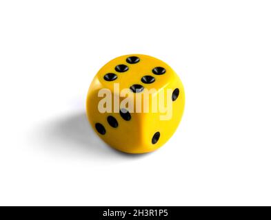 Yellow dice isolated on white background Stock Photo