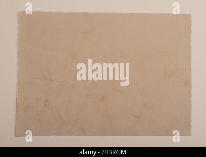 Old vintage paper background. Textured grunge surface. Stock Photo