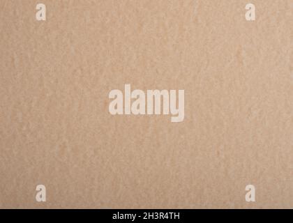 Beige textured paper background. Pastel marble decorative surface. Stock Photo