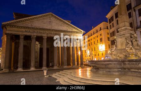 Illuminated Pantheon in Rome by night. One of the most famous historic landmark in Italy. Stock Photo