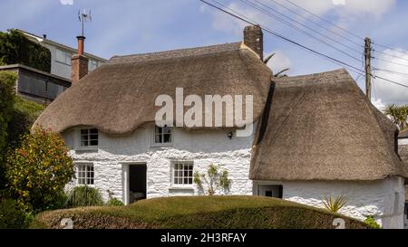 HELSTON, CORNWALL, UK - MAY 14 : Thatched cottage in Helston, Cornwall on May 14, 2021 Stock Photo