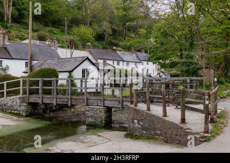 HELSTON, CORNWALL, UK - MAY 14 : Wooden bridge over the stream in Helston, Cornwall on May 14, 2021 Stock Photo