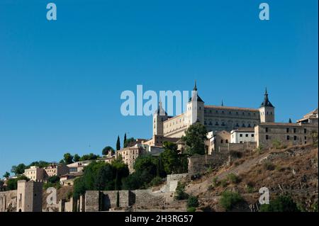 Toledo, Spain The beautiful El Alcazar castle rising high over the historic, medieval city  Landscape aspect view with copy space Stock Photo