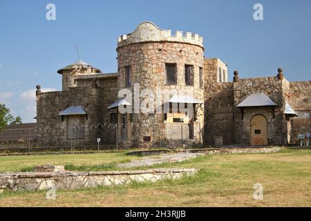 Abandoned Castle With Blue Sky in Rural Texas Stock Photo