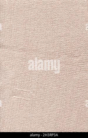 Merino beige wool knit texture for the design. Knitted woolen cotton fabric background in beige cream color. Stock Photo