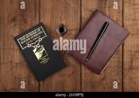 The Murder of Roger Ackroyd, detective novel by Agatha Christie, with leather journal and ink pen Stock Photo