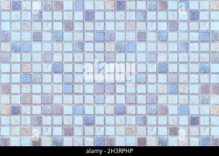 Cellular background with pale blue, pink and brown tiles Stock Photo