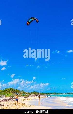 Playa del Carmen Mexico 04. April 2021 Water sport like kitesurfing kiteboarding wakeboarding on tropical mexican beach in Playa del Carmen Mexico. Stock Photo