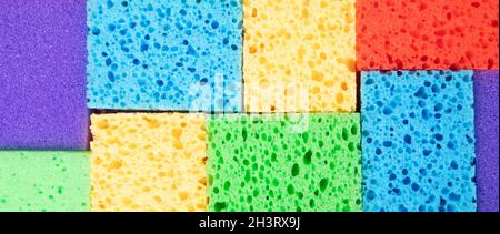 Multi-colored pattern from sponges for washing dishes, background image, panoramic image Stock Photo