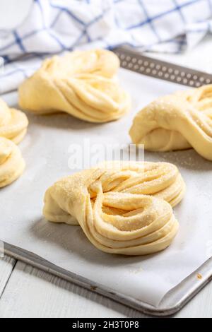 Process of making swirling buns. Stock Photo