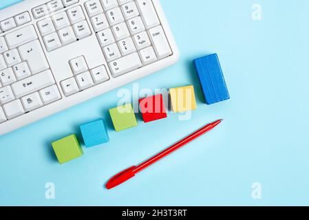 Sample Cube Rectangular Boxes Polished With Multi-Colour Symbolizing Stability Growth Development Aligned On Surface With Differ Stock Photo