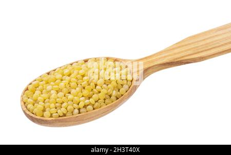 Israeli couscous. Ptitim in wooden spoon isolated on white background Stock Photo