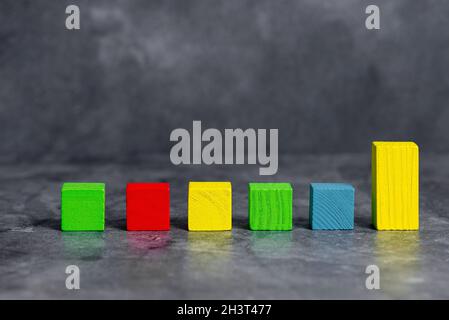 Sample Cube Rectangular Boxes Polished With Multi-Colour Symbolizing Stability Growth Development Aligned On Surface With Differ Stock Photo