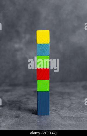 Sample Cube Rectangular Boxes Polished With Multi-Colour Symbolizing Stability Growth Development Aligned On Surface With Differ Stock Photo