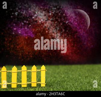 Blue wooden picket fence with blurred green background Stock Photo - Alamy