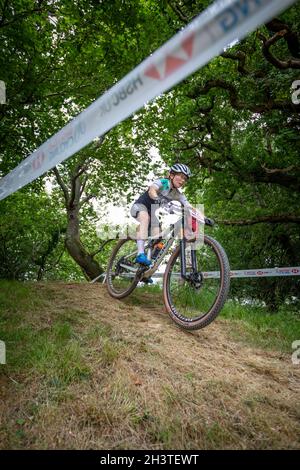 Mountain Bike racers at Nationals. Newnham Park, Plymouth, Devon, England, UK, GB, Europe. Stock Photo