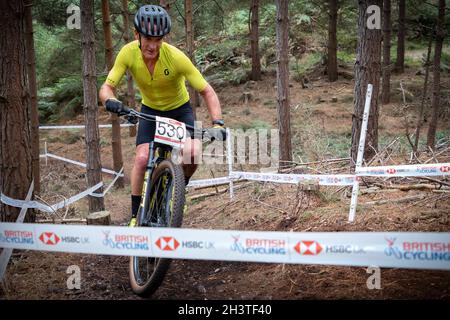 Mountain bike racers in national points series race, Cannock Chase, Staffordshire, England, UK, GB, Europe. Stock Photo