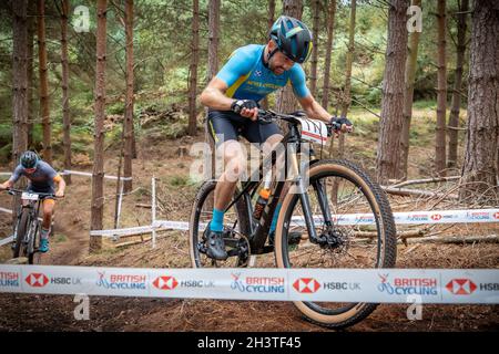 Mountain bike racers in national points series race, Cannock Chase, Staffordshire, England, UK, GB, Europe. Stock Photo