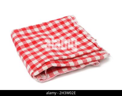Folded cotton red white checkered napkin on a white background Stock Photo