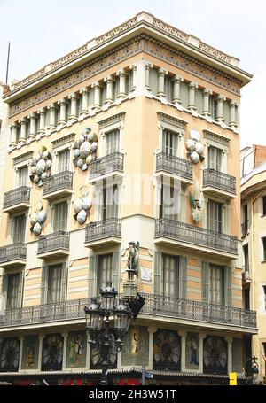 Sculpture of a dragon on the facade of the House of Umbrellas in Las Ramblas in Barcelona, Catalunya, Spain, Europe Stock Photo
