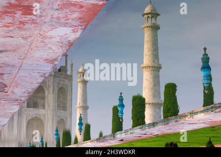 Minarets of the Taj Mahal reflected in the garden's pool Stock Photo