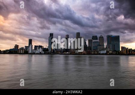 Dusk at Canary Wharf, captured from the Greenwich Peninsula in London, England UK Stock Photo