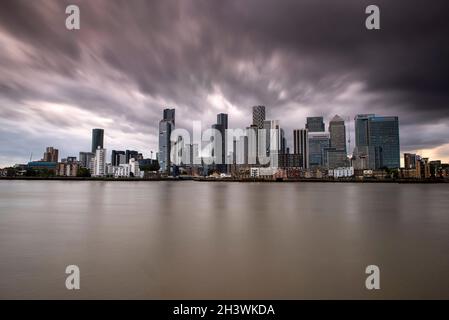 Dusk at Canary Wharf, captured from the Greenwich Peninsula in London, England UK Stock Photo