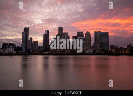 Dusk at Canary Wharf, captured from the Greenwich Peninsula in London, England UK Stock Photo