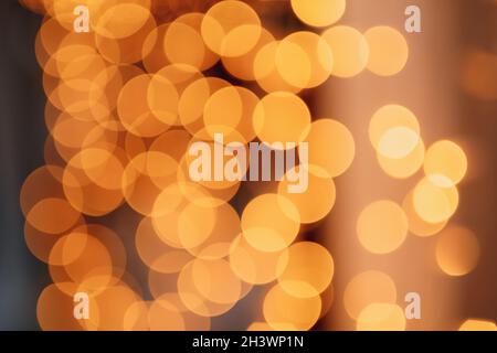 Abstract bokeh lights with soft light background. Garland lights on a black background. Stock Photo