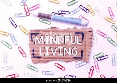 Sign displaying Mindful Living. Word Written on Fully aware and engaged on something Conscious and Sensible Creative Home Recycling Ideas And Designs Stock Photo