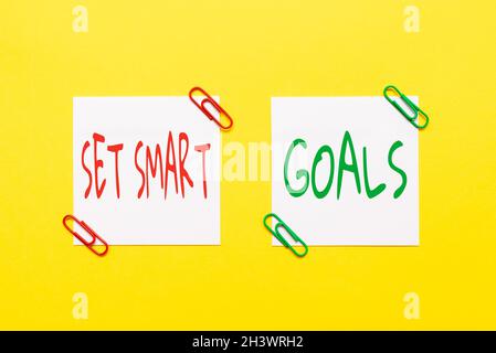 Conceptual caption Set Smart Goals. Business approach giving criteria to guide in the setting of objectives Critical Thinking Finding Clues Answering Stock Photo