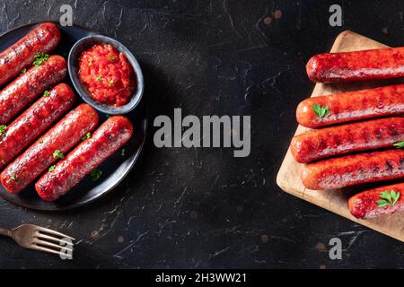 Grilled sausages with a place for text. Beef and pork sausage, shot from the top Stock Photo