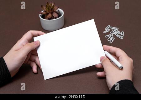 Woman Hand Holding Blank Notes Writing New Messege Updates Ideas. Lady Palm Showing Envelope Folding Sending Letters Post Addres Stock Photo