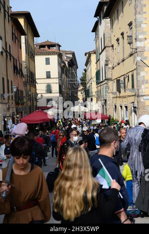 Lucca Comics and Games 2021, The city of Lucca and its squares are back to fill up thanks to the crowd of people passionate about comics and the Lucca Comics and Games, in the photo crowd of people in the street for the comic event. Stock Photo