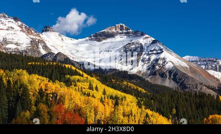 Colorado fall colors with Aspen trees and snow in the San Juan Mountains near Telluride Stock Photo