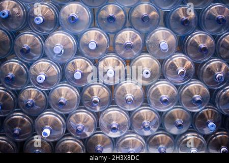 Image of a group of large empty water jugs. Stock Photo
