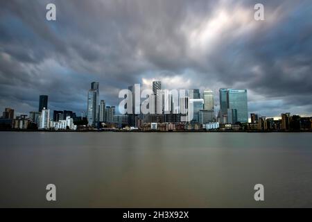 Dusk at Canary Wharf, captured from the Greenwich Peninsula in London, England UK Stock Photo