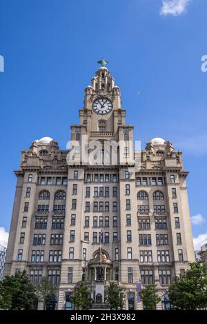 LIVERPOOL, UK - JULY 14 : The Royal Liver building with a clock tower in Liverpool, England on July 14, 2021. Stock Photo