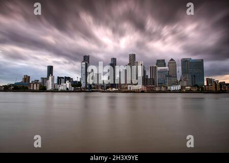 Dusk at Canary Wharf, captured from the Greenwich Peninsula in London, England UK Stock Photo